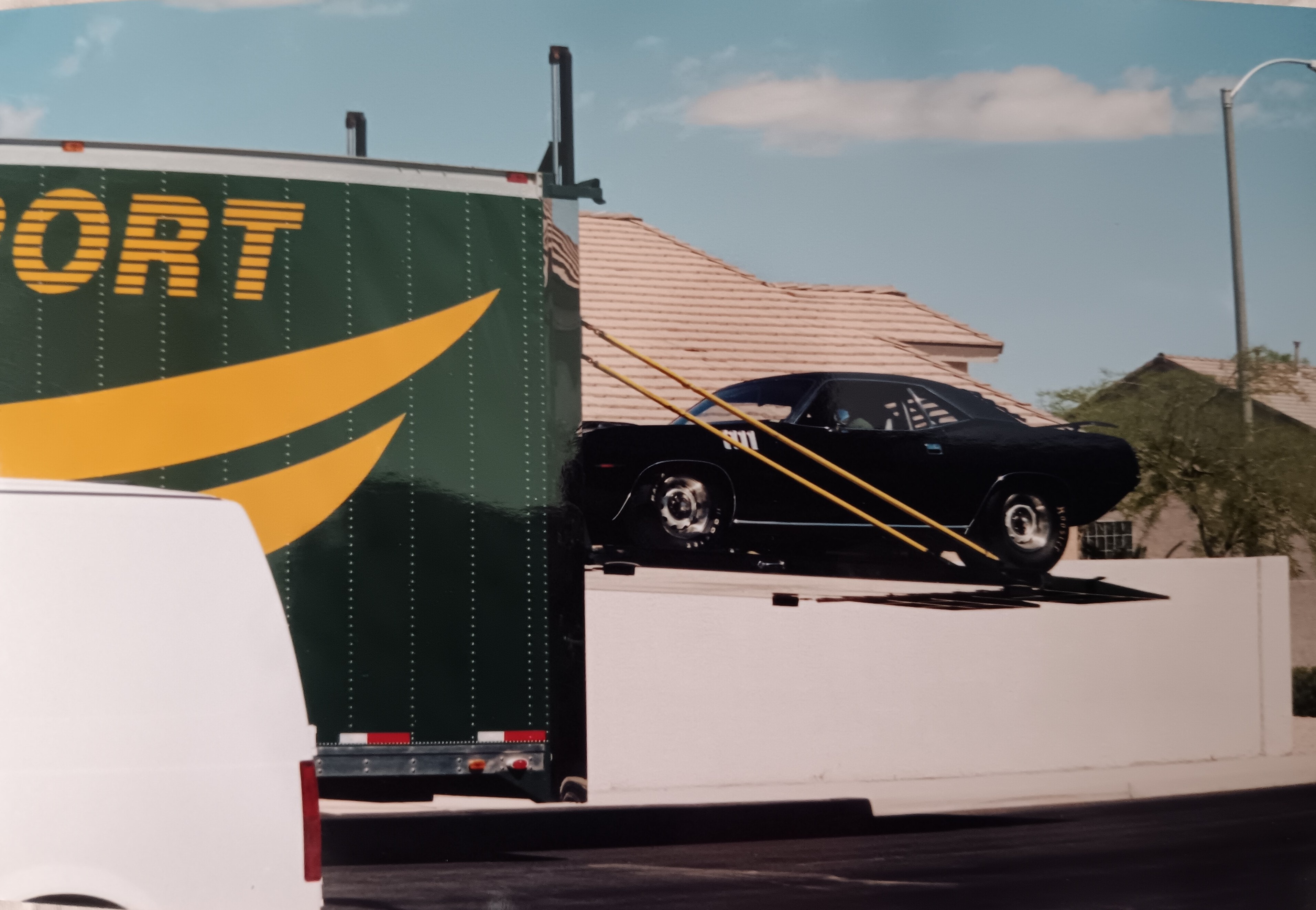 The Black Beast arriving home — Dan Powell's double-black 1971 440-6 Cuda with 426 Super Stock Hemi delivered to Don Almeido, purchased site unseen from Hemmings Motor News