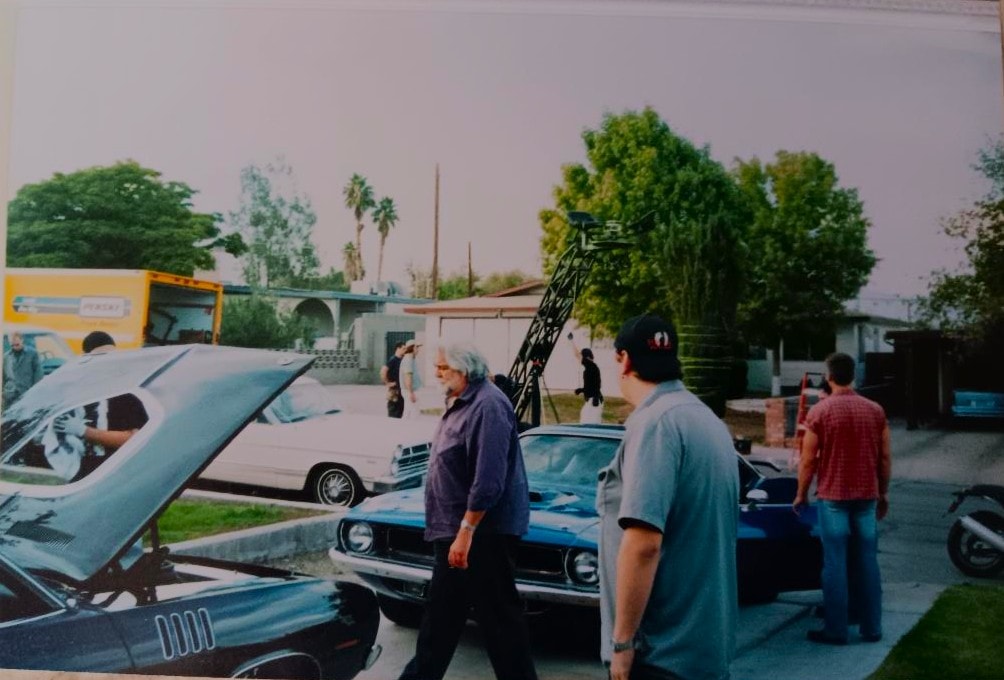 Gunnar Hansen on the Murder-Set-Pieces set with the Black Beast — the actor known as Leatherface from The Texas Chain Saw Massacre, before a scene with the 1971 Cuda, Las Vegas 2004