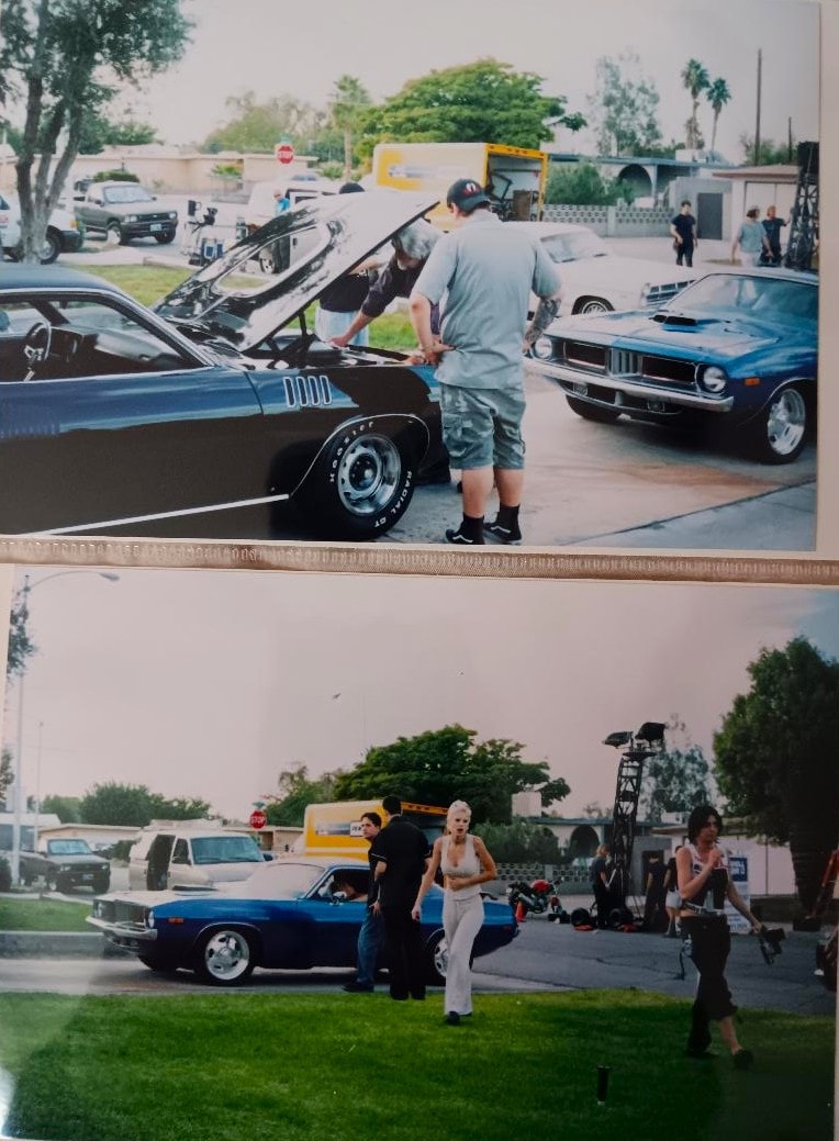 The Black Beast on the Murder-Set-Pieces film set in Las Vegas — hood up, production crew and cast gathered around the car, film crane visible in background, 2004