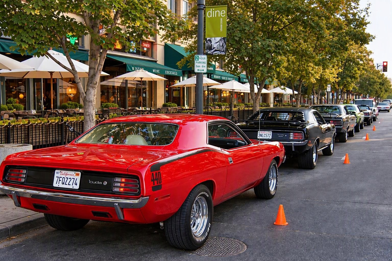 Classic Cudas and muscle cars lined up on 8th Street in Boise — a Special Invitation show appearance on the Nevada, Southern California and Idaho circuit