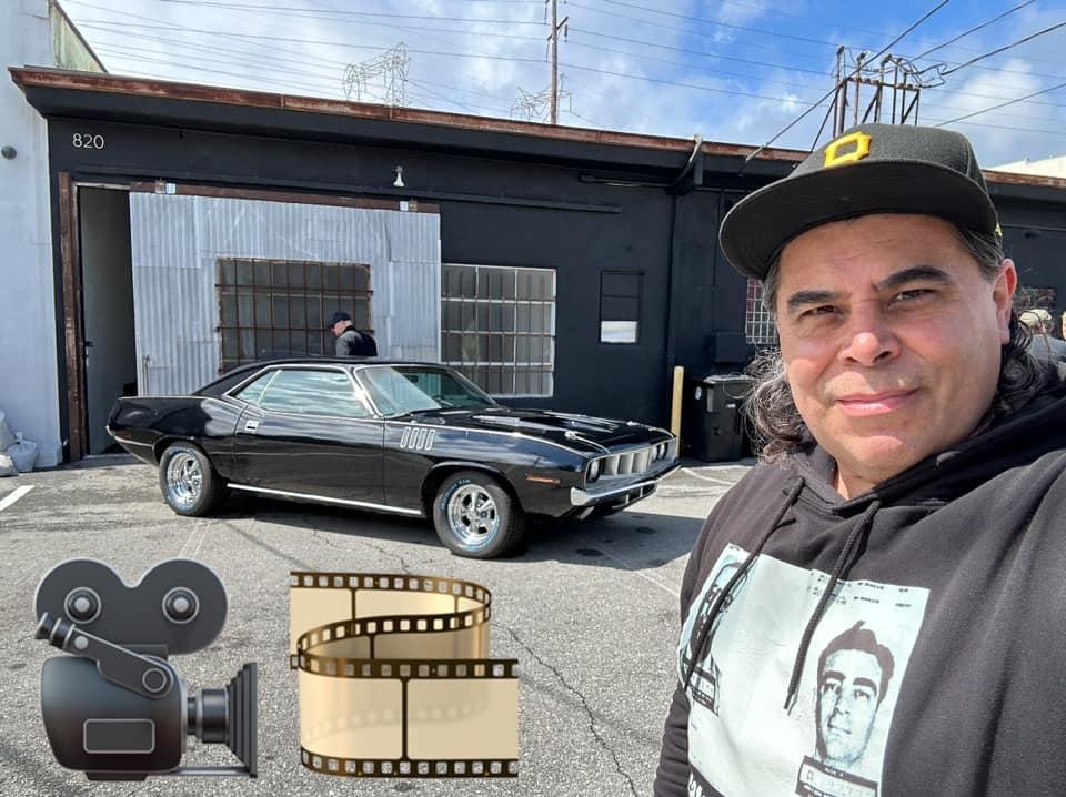 Book signing event — fan photo with the Phantasm II movie car