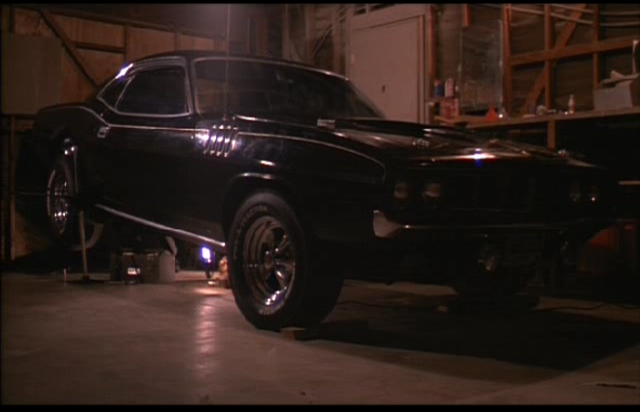 Mike underneath the Phantasm Cuda working on exhaust system. Classic Friday evening well spent.