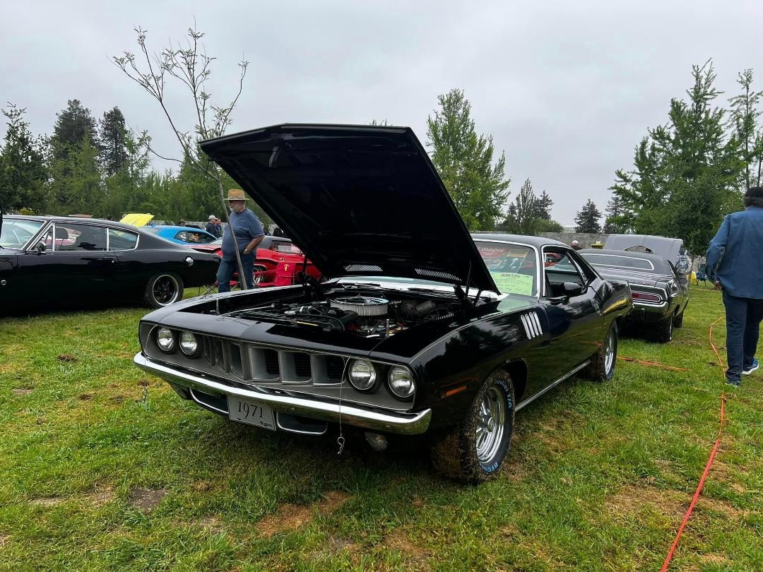 The Phantasm II movie car out of hibernation — hood up at a car show