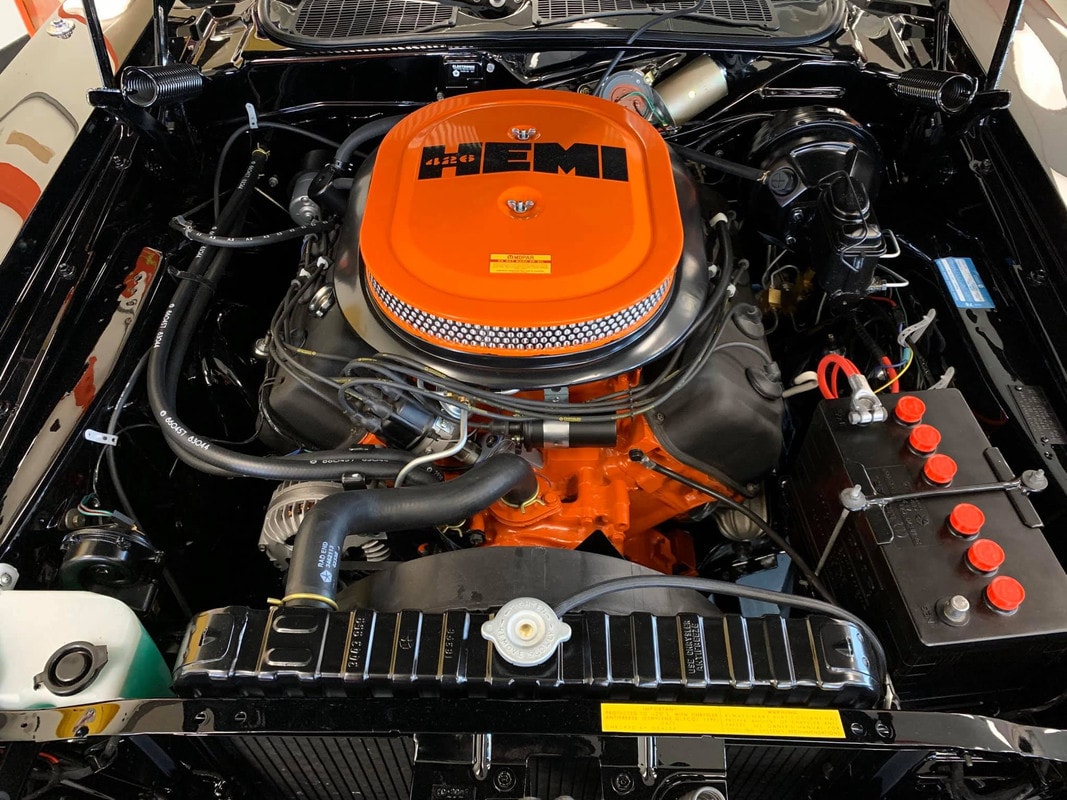 426 Hemi engine bay — orange block, correct air cleaner assembly.